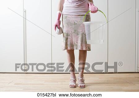 detail of young woman ready to do housecleaning View Large Photo Image Stock Image - detail of young woman ready to do housecleaning. Fotosearch