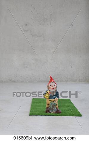 garden gnome holding duck View Large Photo Image Stock Image - garden gnome holding duck. Fotosearch