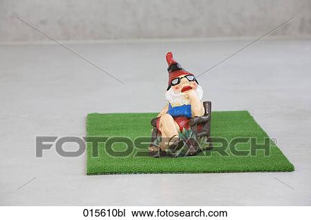 garden gnome relaxing in chair View Large Photo Image Stock Image - garden gnome relaxing in chair. Fotosearch