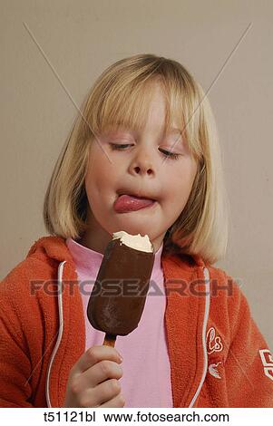 Stock Image - Girl eating ice cream. Fotosearch