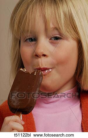 Girl eating ice cream View Large Photo Image Stock Image - Girl eating ice cream. Fotosearch