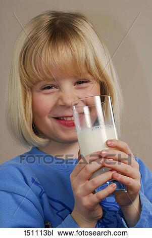 Girl with a glass of milk View Large Photo Image Stock Image - Girl with a glass of milk. Fotosearch