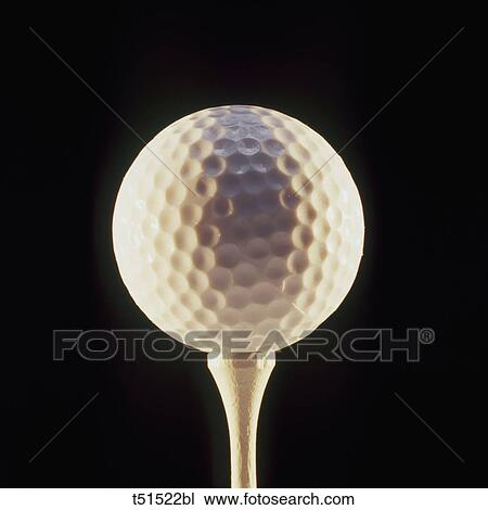 Golf ball on tee View Large Photo Image Stock Image - Golf ball on tee. Fotosearch