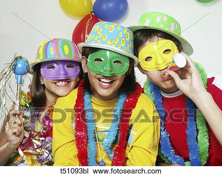 Group of children at carnival party View Large Photo Image Stock Image - Group of children at carnival party. Fotosearch