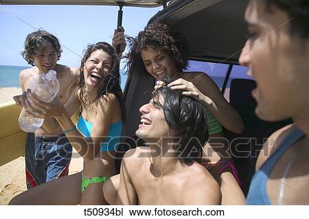 Group of friends at sea View Large Photo Image Stock Image - Group of friends at sea. Fotosearch