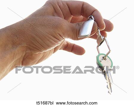 Hand holding keys View Large Photo Image Stock Image - Hand holding keys. Fotosearch