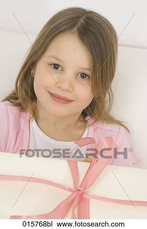 headshot of girl with present View Large Photo Image Stock Image - headshot of girl with present. Fotosearch