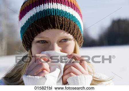 headshot of teenage girl in winter with tissue View Large Photo Image Stock Image - headshot of teenage girl in winter with tissue. Fotosearch
