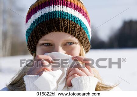 headshot of teenage girl in winter with tissue View Large Photo Image Stock Image - headshot of teenage girl in winter with tissue. Fotosearch