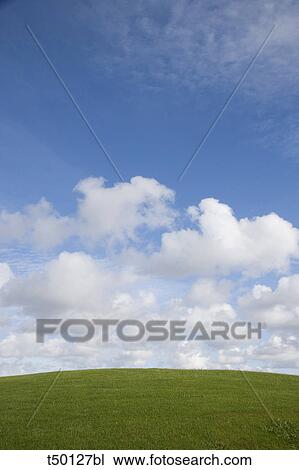 Hill and clouds View Large Photo Image Stock Image - Hill and clouds. Fotosearch