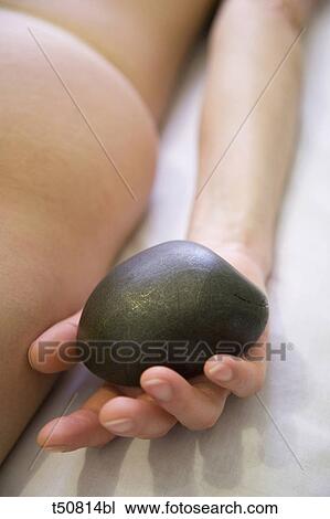 Hot stone therapy View Large Photo Image Stock Image - Hot stone therapy. Fotosearch