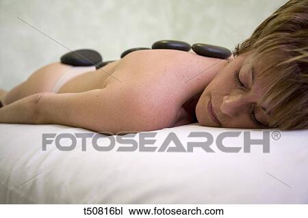 Hot stone therapy View Large Photo Image Stock Image - Hot stone therapy. Fotosearch