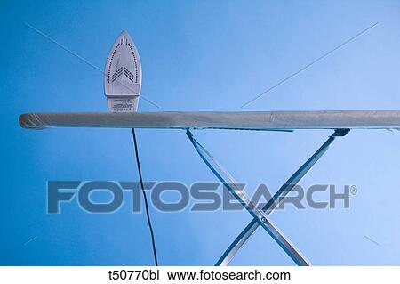 Iron board and iron View Large Photo Image Stock Image - Iron board and iron. Fotosearch