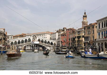 Stock Image - Italy, Veneto, Venice, the Grand Canal with view toward the Rialto Bridge. Fotosearch