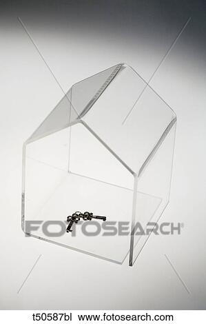 Keys in transparent house View Large Photo Image Stock Image - Keys in transparent house. Fotosearch