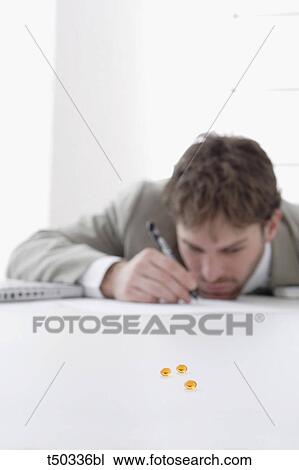 Man and pills View Large Photo Image Stock Image - Man and pills. Fotosearch