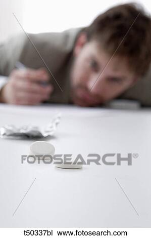Man and pills View Large Photo Image Stock Image - Man and pills. Fotosearch