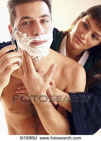 Man and woman in the bathroom View Large Photo Image Stock Image - Man and woman in the bathroom. Fotosearch