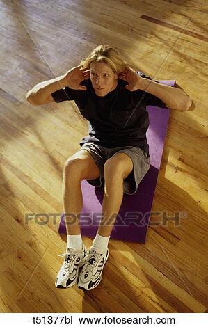 Man doing situps View Large Photo Image Stock Image - Man doing situps. Fotosearch