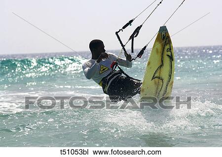 Man kitesurfing View Large Photo Image Stock Image - Man kitesurfing. Fotosearch