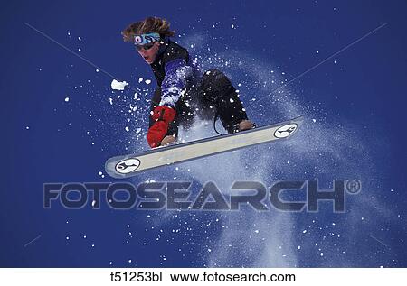 Man on snowboard View Large Photo Image Stock Image - Man on snowboard. Fotosearch