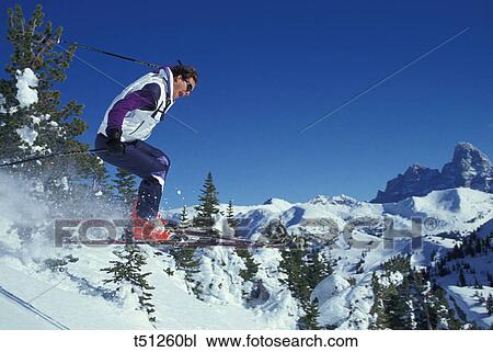 Man skiing View Large Photo Image Stock Image - Man skiing. Fotosearch