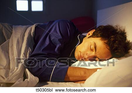 Stock Image - Man sleeping. Fotosearch