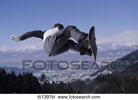Man snowboarding vert View Large Photo Image Stock Image - Man snowboarding vert. Fotosearch