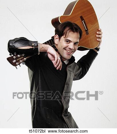 Man's portraut with guitar View Large Photo Image Stock Image - Man's portraut with guitar. Fotosearch