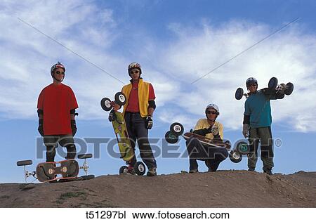 Men with skateboards View Large Photo Image Stock Image - Men with skateboards. Fotosearch