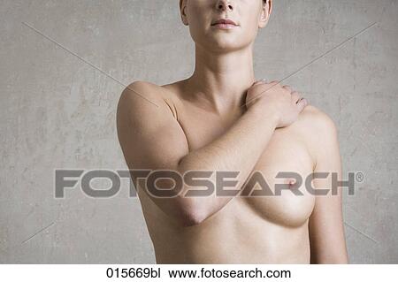 Naked Young Woman Covering One Of Her Breasts Naked Young Woman Covering One Of Her Breasts