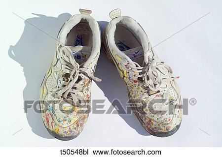Stock Image - Pair of dirty shoes. Fotosearch