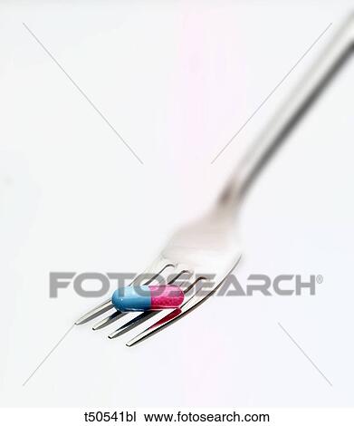 Pill on fork View Large Photo Image Stock Image - Pill on fork. Fotosearch