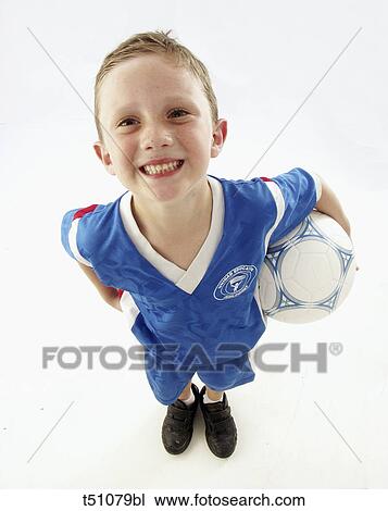 Portrait of a young soccer player View Large Photo Image Stock Image - Portrait of a young soccer player. Fotosearch