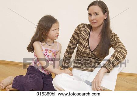 portrait of mother and sulking little daughter View Large Photo Image Stock Image - portrait of mother and sulking little daughter. Fotosearch