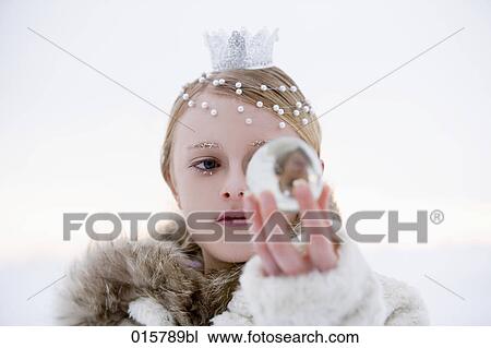 portrait of snow queen holding crystal ball View Large Photo Image Stock Image - portrait of snow queen holding crystal ball. Fotosearch