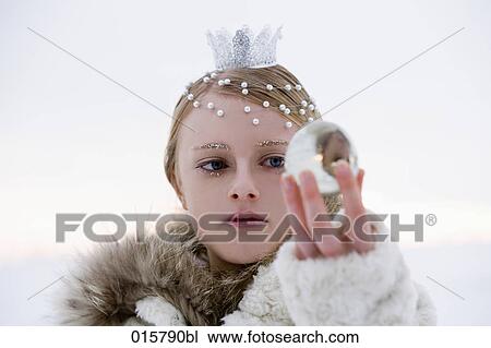 portrait of snow queen holding crystal ball View Large Photo Image Stock Image - portrait of snow queen holding crystal ball. Fotosearch