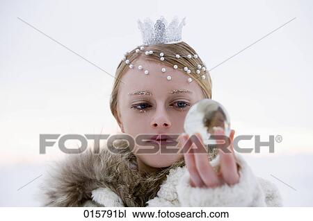 portrait of snow queen holding crystal ball View Large Photo Image Stock Image - portrait of snow queen holding crystal ball. Fotosearch