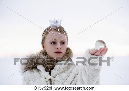 portrait of snow queen holding crystal ball View Large Photo Image Stock Image - portrait of snow queen holding crystal ball. Fotosearch