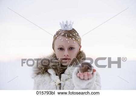 portrait of snow queen holding crystal ball View Large Photo Image Stock Image - portrait of snow queen holding crystal ball. Fotosearch