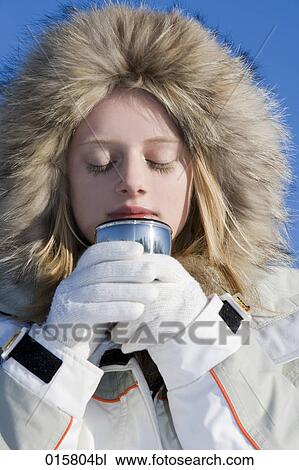 portrait of teenage girl in winter smelling hot drink View Large Photo Image Stock Image - portrait of teenage girl in winter smelling hot drink. Fotosearch