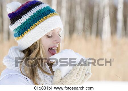 portrait of teenage girl licking on piece of snow View Large Photo Image Stock Image - portrait of teenage girl licking on piece of snow. Fotosearch