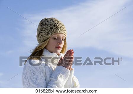 portrait of teenage girl with folded hands in winter View Large Photo Image Stock Image - portrait of teenage girl with folded hands in winter. Fotosearch