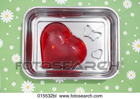 red heart and cookie cutter in shape of butterfly in silver bowl View Large Photo Image Stock Image - red heart and cookie cutter in shape of butterfly in silver bowl. Fotosearch