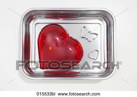 red heart and cookie cutter in shape of butterfly in silver bowl View Large Photo Image Stock Image - red heart and cookie cutter in shape of butterfly in silver bowl. Fotosearch