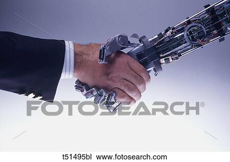 Robot and man handshaking View Large Photo Image Stock Image - Robot and man handshaking. Fotosearch