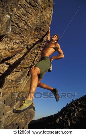 Stock Image - Rock climbing. Fotosearch