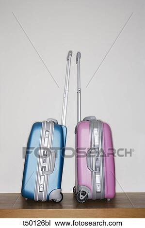 Rolling luggage View Large Photo Image Stock Image - Rolling luggage. Fotosearch