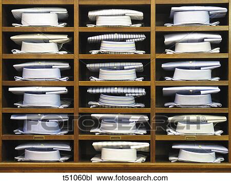 Shirts on shelves View Large Photo Image Stock Image - Shirts on shelves. Fotosearch
