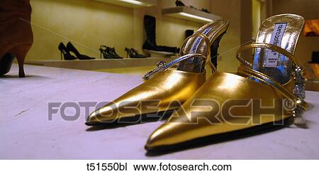 Shoes on display in a shop View Large Photo Image Stock Image - Shoes on display in a shop. Fotosearch